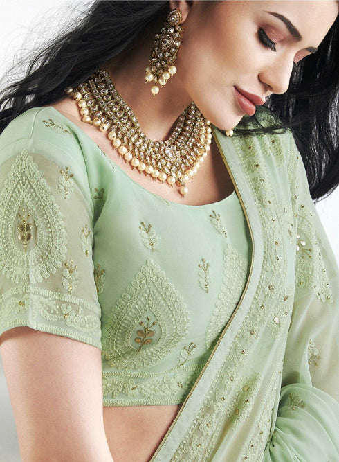 Light green coloured Georgette Saree with Lakhnavi Work Border